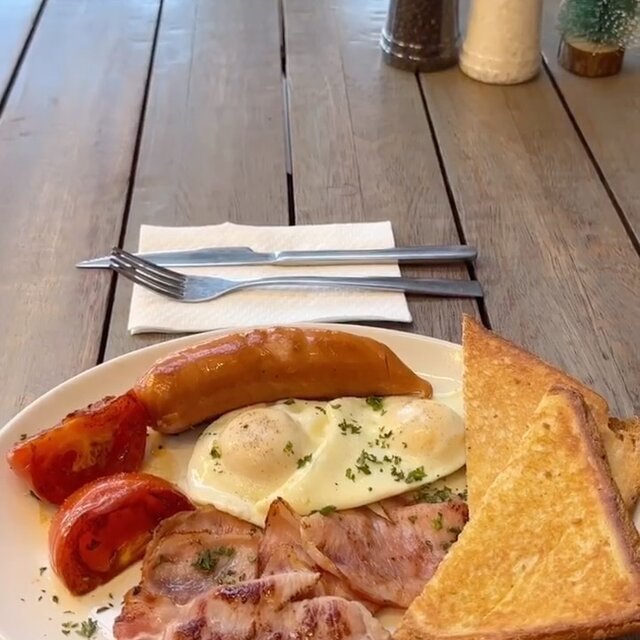 Full breakfast plate with Meat Mania bacon and sausage